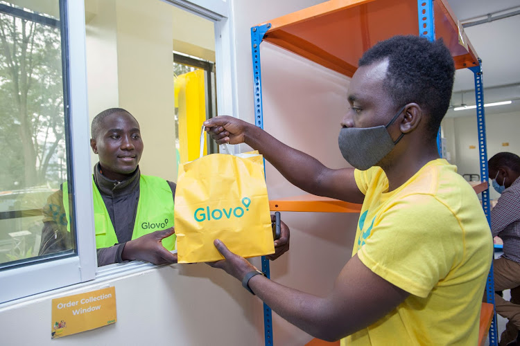 Glovo rider picking up a delivery