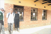 BAD STATE:  Pupils stand outside a classroom of the dilapidated Refilwe Secondary School in Klopper, Limpopo, which does not have ceilings and windows.   PHOTO: MABUTI KALI