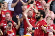  Liverpool's Egyptian star forward Mohamed Salah celebrates after scoring in a commanding 3-1 Premier League win over Arsenal at Anfield on August 24 2019. 