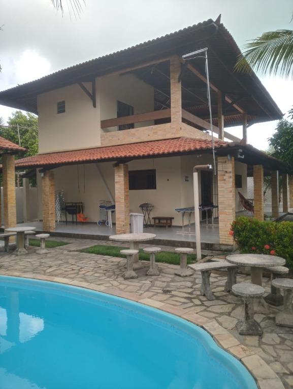 Casa com 3 dormitórios, por R$ 670.000,00 - 30 metros da Praia de Carapibus