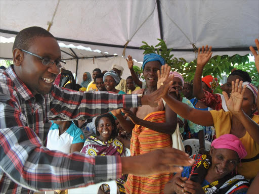 WIlly Mtengo, ODM parliamentary candidate for Malindi Member of Parliament, greets supporters, February 5, 2016. Photo/ALPHONSE GARI