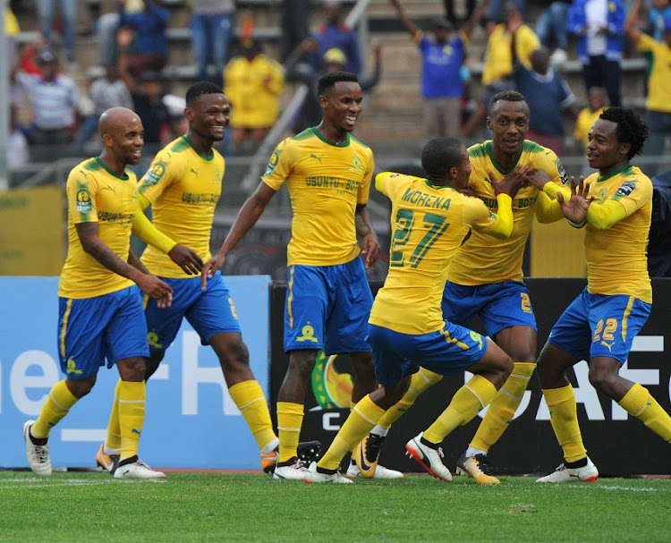 Mamelodi Sundowns players celebrating a goal scored by Krahire Zakri(24) of Mamelodi Sundowns during 2017 Caf Champions League game between Mamelodi Sundowns and Wydad AC at Lucas Moripe Stadium on 17 September 2017.