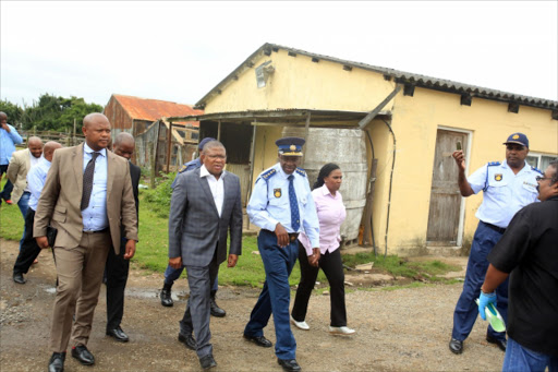 Police Minister Fikile Mbalula, who visited one of the crime scenes declared war against drug traffickers. Picture: SINO MAJANGAZA