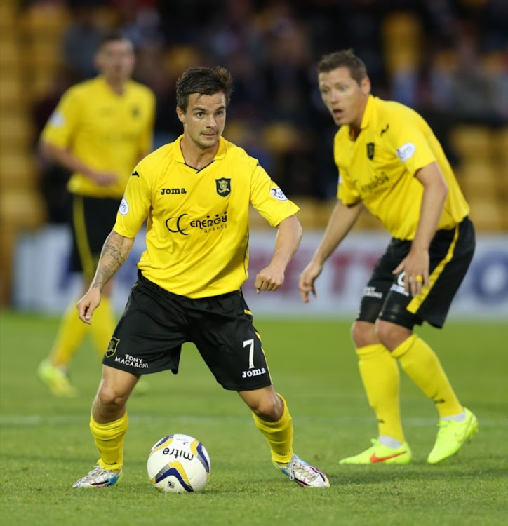 Keaghan Jacobs of Livingston controls the ball during Petrofac Training Cup second round match between Livingston and Hearts at Almondvale Stadium on August 20, 2014 Livingston, Scotland.