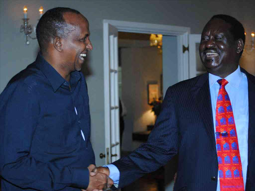 A file photo of Cord leader Raila Odinga with National Assembly Majority leader Aden Duale.