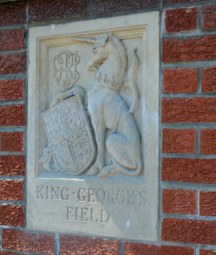 One of two reliefs on the gateposts at the King Georges Fields on the Larne Road. For a short history of the scheme and photographs of other examples see the shared description below. © Copyright...