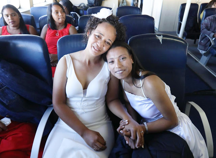 Marcia Jumat and Rozeana Julius aboard the ferry Sikhululekile on their way to get married on Robben Island on February 14 2019.