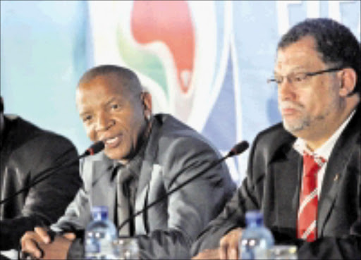 ROPED IN: Lebo M and LOC's chief execuitive officer Danny Jordaan address the media at Safa House yesterday. 14/05/2009. Pic. Veli Nhlapo. © Sowetan.