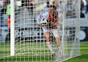 Roscoe Pietersen of Ajax Cape Town retrieves the ball from the net during the Absa Premiership game against Kaizer Chiefs at Cape Town Stadium on May 12 2018.