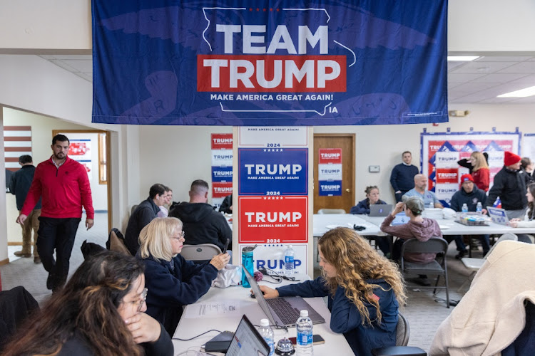 Volunteers work at a former US president Donald Trump's campaign headquarters in Urbandale, Iowa, the US, January 13 2024. Picture: JEENAH MOON/REUTERS