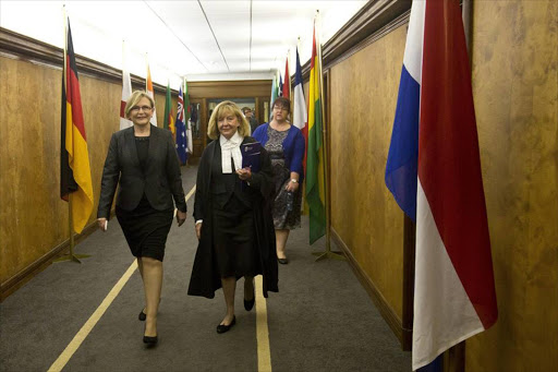 Western Cape Premier Hellen Zille arrives with Deputy Judge President Jeanette Traverso at the Western Cape Legislature to be sworn in as Premier of the Province for a second time.
