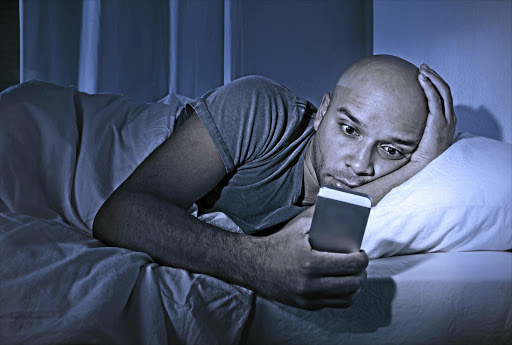 The blue light from digital devices wrecks the quality of your snooze.