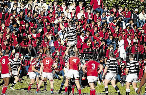 ALL IN HAND: Hudson Park High School’s first team (in red) and Selborne College’s first team compete for the ball at a lineout in front of the Hudson fans during their derby day last season Picture: MARK ANDREWS