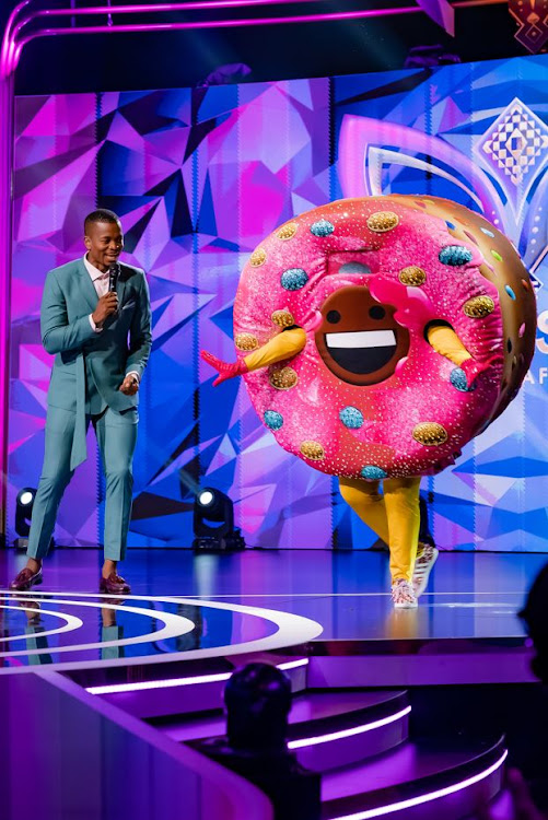 Guess which celebrity is behind the doughnut costume on The masked singer.