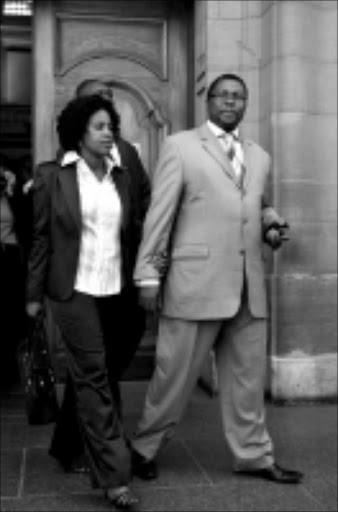 Hearing Transnet boss Siyabonga Gama with wife. Pic: Peter Mogaki. 07/10/2009. © Sowetan.