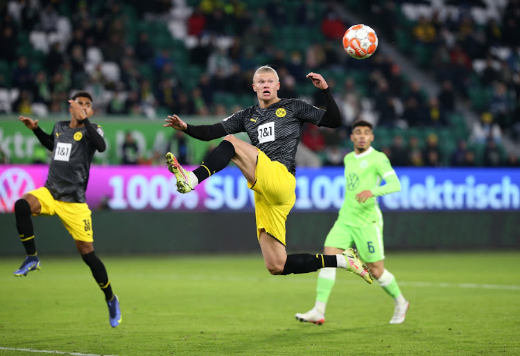 Borussia Dortmund's Erling Braut Haaland scores their third goal.