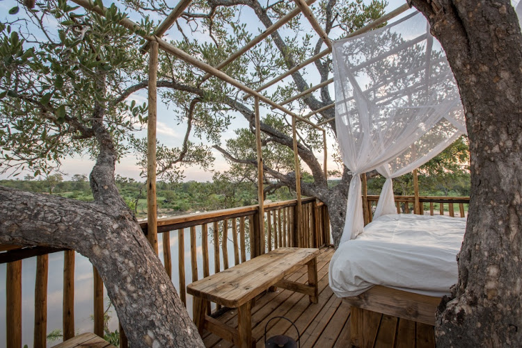 You could be enjoying the great outdoors from this bed at Umlani Bushcamp.