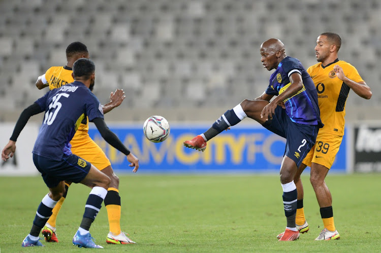 Thamsanqa Mkhize of Cape Town City is challenged by Reeve Frosler of Kaizer Chiefs during the DStv Premiership 2021/22 game between Cape Town City and Kaizer Chiefs at Cape Town Stadium on 15 February.