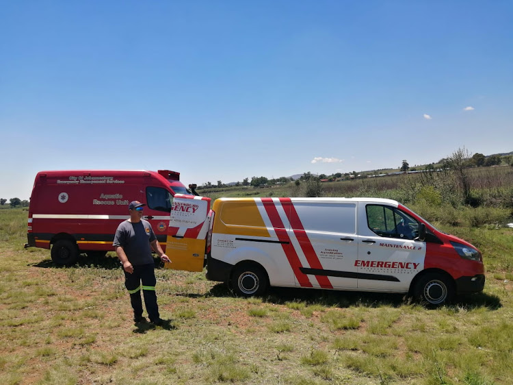 Rescue teams search for two bodies that were swept away during a cleansing ritual at the Kliprevier river in Oliphantsvlei, South of Johannesburg.