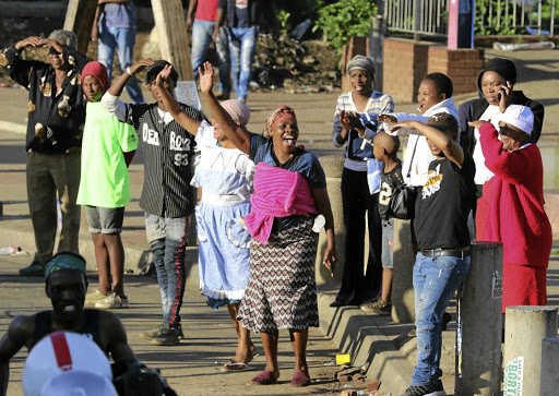 Soweto residents cheer in support of marathon runners on Sunday, making it truly the People's Race, says the writer.