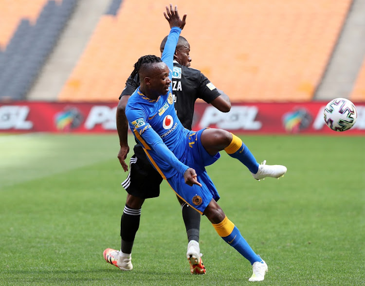 Khama Billiat of Kaizer Chiefs is challenged by Ntsikelelo Nyauza of Orlando Pirates during the MTN8, semifinal on November 8 2020 at the FNB Stadium in Johannesburg.