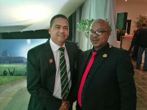 Border Cricket President Thando Ganda (right) congratulates umpire Shaun George after he claimed the two major umpiring awards on the night at the 2017 CSA Awards Ceremony at Kyalami on the Track in Johannesburg on Saturday night. Picture: ROSS ROCHE