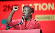 EFF leader Julius Malema addressing the party's national people's assembly at Nasrec in Johannesburg on Saturday. 