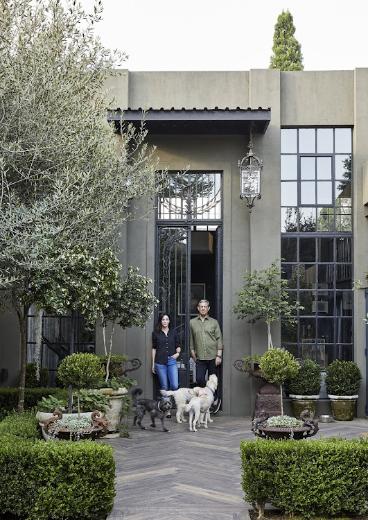 This antique chateau door was the kick-off point for the design of Christian van der Walt and Anli Jones' (pictured) home.