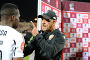 Highlands Park coach Owen Da Gama speaks to Tshegofatso Mabasa of Orlando Pirates during the Absa Premiership match between Highlands Park and Orlando Pirates at Makhulong Stadium on October 29, 2019 in Johannesburg, South Africa. 