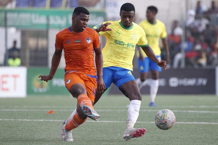 Mohamed Said of FC Nouadhibou is challenged by Teboho Mokoena of Mamelodi Sundowns in their Caf Champions League group match at Stade Cheikha Ould Boïdiya in Nouakchott, Mauritania on Saturday.