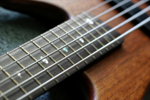 Bass guitar fretboard. File photo.