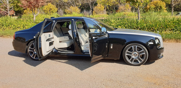 Easier entry to the back is facilitated by rear-opening “suicide” doors. The front doors, in Rolls-Royce tradition, have brollies stashed inside them.