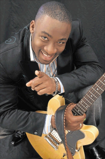 upbeat: Ayo knows his strings.