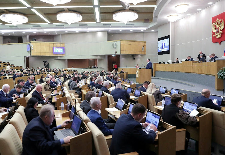 Deputies attend a plenary session of the State Duma, the lower house of parliament, to discuss a bill allowing the confiscation of property from those convicted of a number of crimes including spreading "deliberately false information" about the Russian army, in Moscow, Russia January 24, 2024.