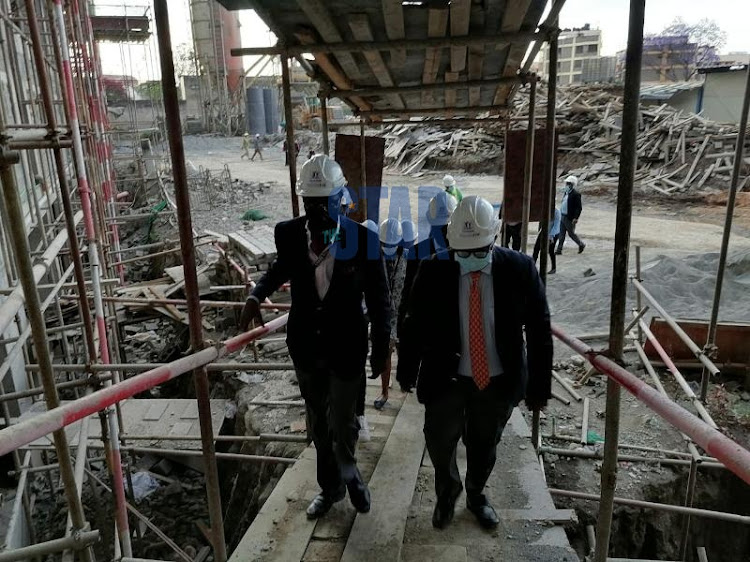 Principal Secretary for Housing and Urban Development Charles Hinga inspecting the Affordable Housing Programme Project in Pangai, Nairobi on September 27, 2021.