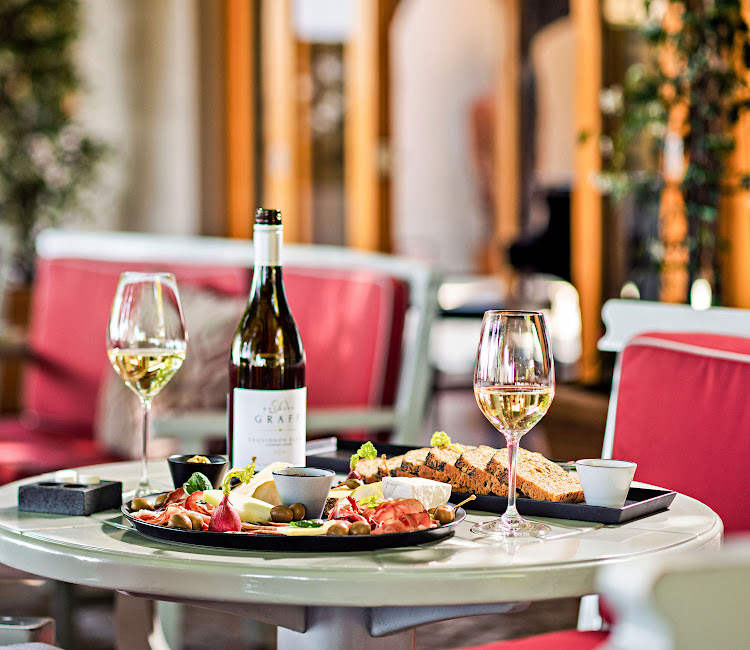 Wine and sharing platters on the Delaire Graff Estate Wine Terrace.