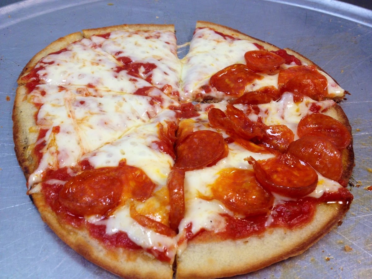 10in Gluten free pizza - made with homemade sauce, fresh cut cheese, and hand slices pepperoni. Deli