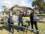 A small group of animal rights activists gathered outside Durban's Greyville Racecourse on Saturday morning to protest against the country's biggest race horsing event. 
