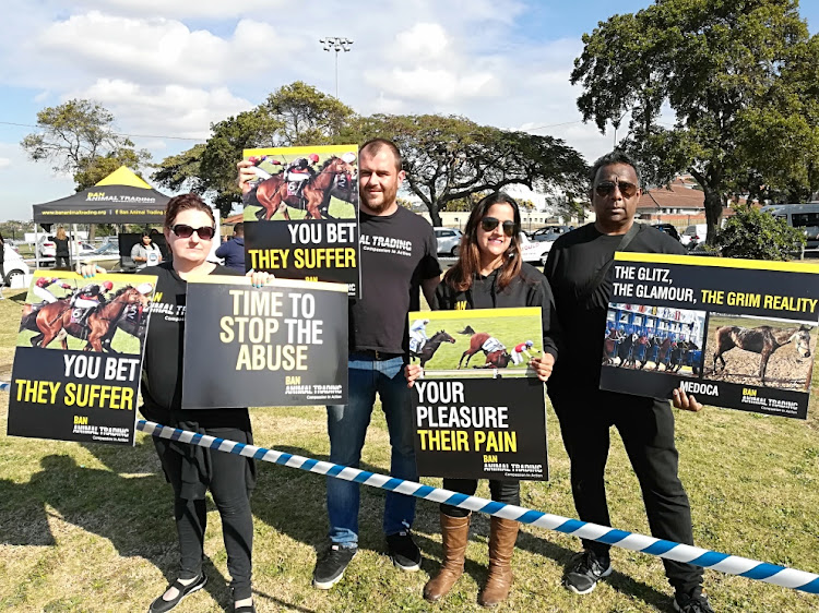 A small group of animal rights activists gathered outside Durban's Greyville Racecourse on Saturday morning to protest against the country's biggest race horsing event.