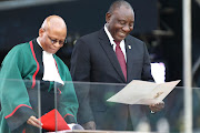 A joyous moment between President Cyril Ramaphosa and Chief Justice Mogoeng Mogoeng during Ramaphosa's inauguration at Loftus Versfeld stadium in Pretoria on 25 May 2019.