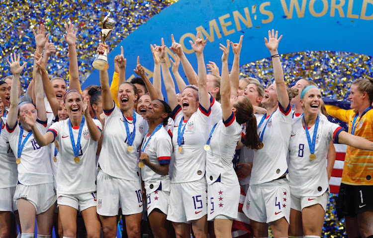 The US women's soccer team celebrate after beating the Netherlands 2-0 to win the Fifa Women's World Cup in France on July 7 2019.