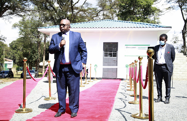 Housing and Urban Development PS Charles Hinga speaks during the launch of Austrian Company Neulandt GmBH in Kenya at the Nairobi Showground on September 23, 2021