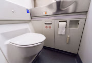 Where does the contents of airplane toilets go once flushed?