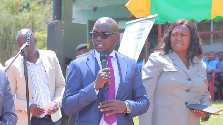 Trade CEC Bernard Maina addresses traders at Makairo Market on Friday./ALVIN RATEMO