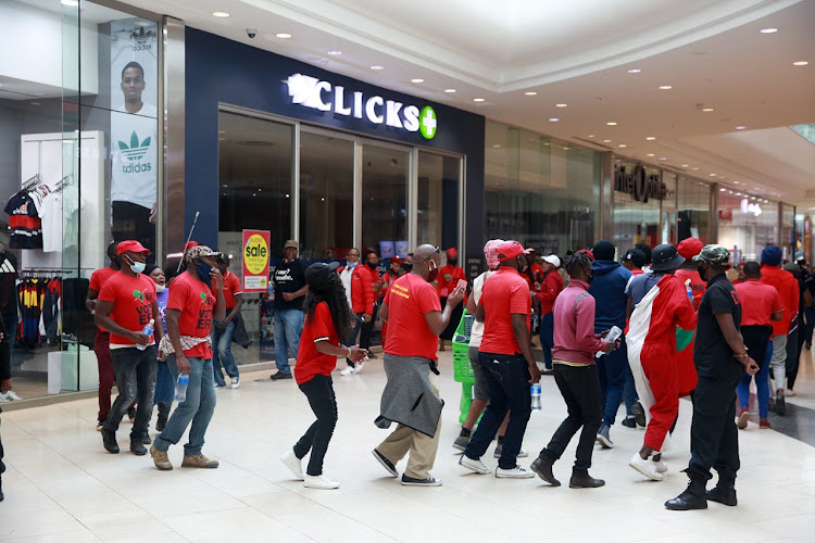 EFF members danced and sang protest songs outside the Clicks store in the Mall of Africa.