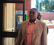 Renowned actor Rapulana Seiphemo at the Roodepoort Magistrate's court on February 18, 2013 in Johannesburg, South Africa. Seiphemo was arrested after he allegedly slapped a female friend, Mphowarona Motsaathebe. The charges against him were withdrawn.