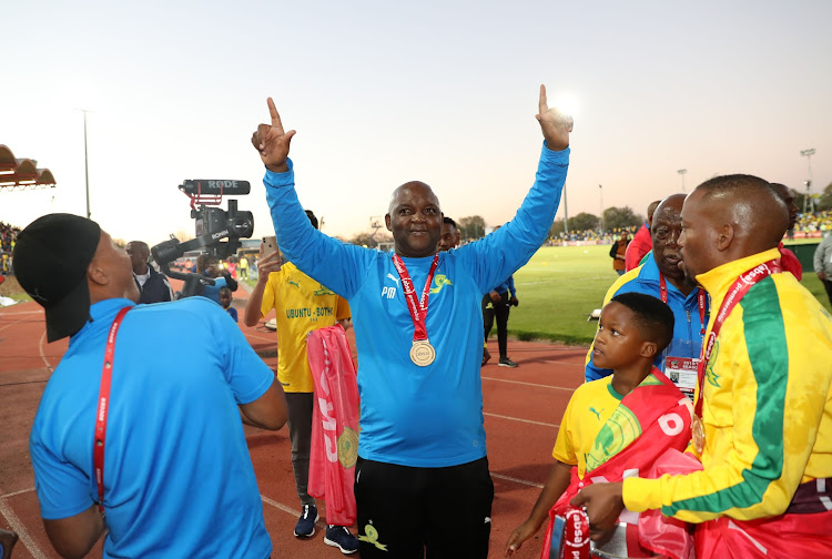 Mamelodi Sundowns head coach Pitso Mosimane celebrates after winning the league title.