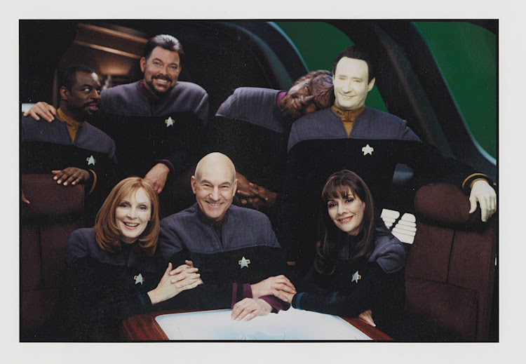 The cast of 'Star Trek: Next Generation: A happy day on the Enterprise'. Clockwise from left: LeVar Burton, Jonathan Frakes, Michael Dorn, Brent Spiner, Marina Sirtis, Patrick Stewart, and Gates McFadden.