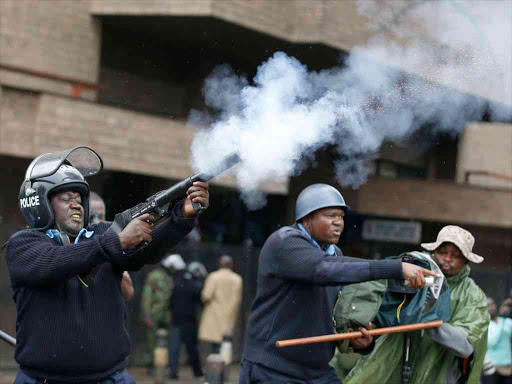 Police lob teargas at protesters pressing for the removal of IEBC commissioners. The Opposition leaders suspended the weekly demos on Wednesday. Photo/FILE