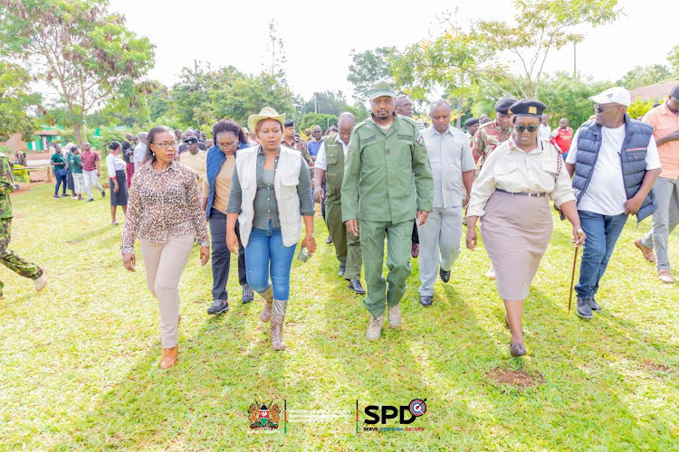 Public Services, Performance and Service Delivery Cabinet Secretary Moses Kuria (center) with Principal Secretary Veronica Nduva (second left) and Kisumu county commissioner Susan Waweru during the national tree planting exercise in Kisumu on May 10, 2024.